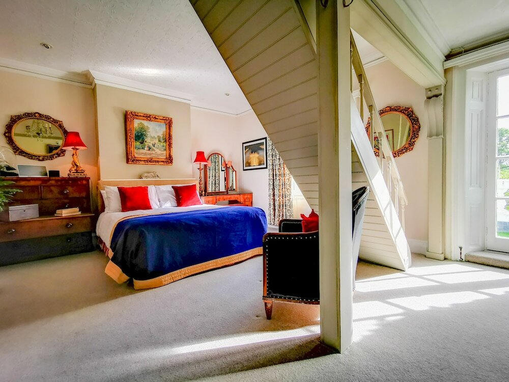 Фото Cedar House Boutique B&b