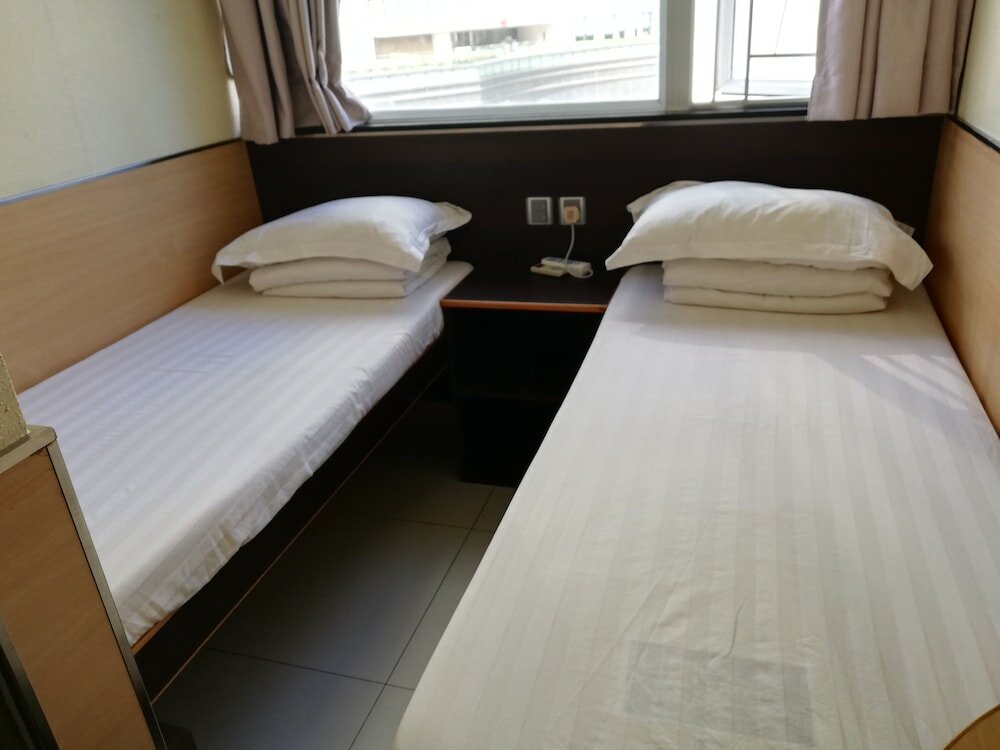 Фото New China Guesthouse