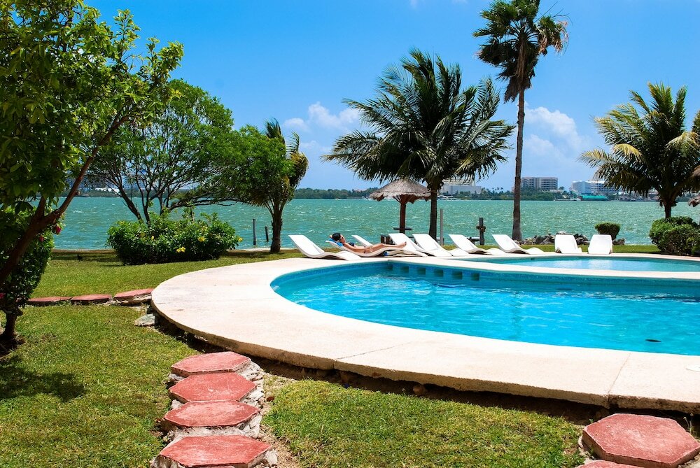 Фото Pok-Ta-Pok Guest House