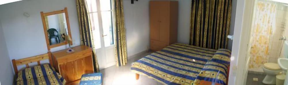 Фото Alexandros Rooms & Studios