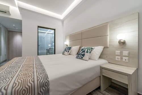 Гостиница Mandala Seafront Suites