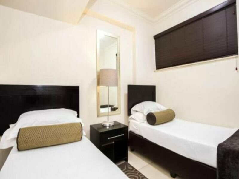 Фото Belaire Suites Hotel