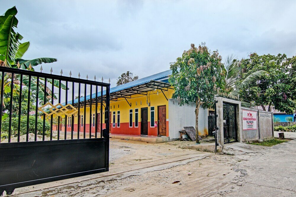 Фото Oyo 92223 Alfatar Homestay Syariah