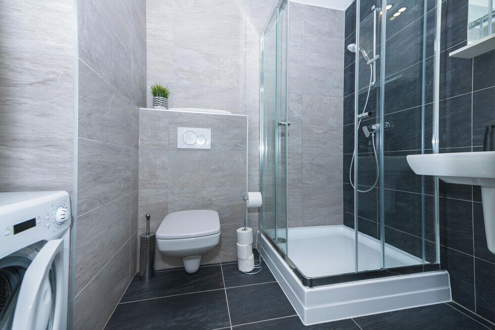 Фото WaterFront City Apartments by UrbanRent