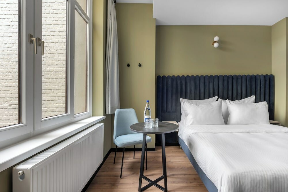 Фото Numa i Scoop Rooms & Apartments