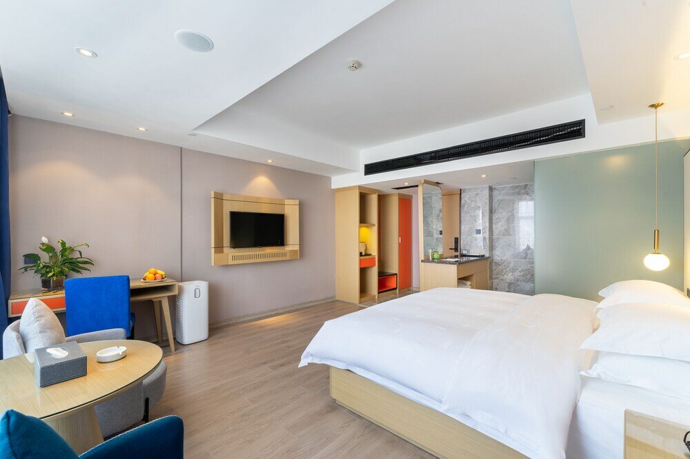 Фото Yì Wū Shì Bó Yì Měi Jū Hotel