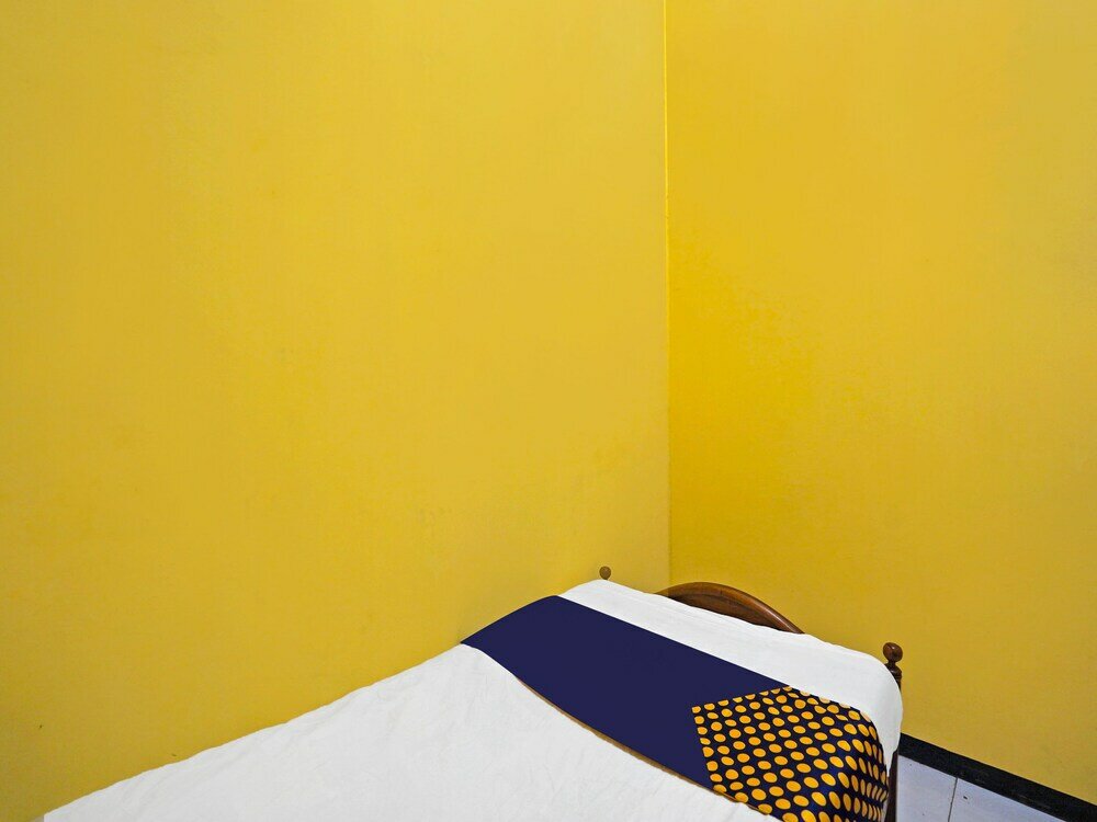 Фото Spot On 91869 Insan Mulia Kost Syariah