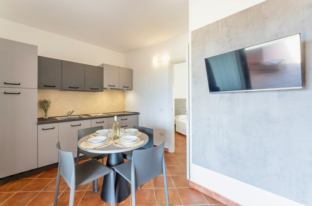 Фото Residence with pool in Isola Rossa