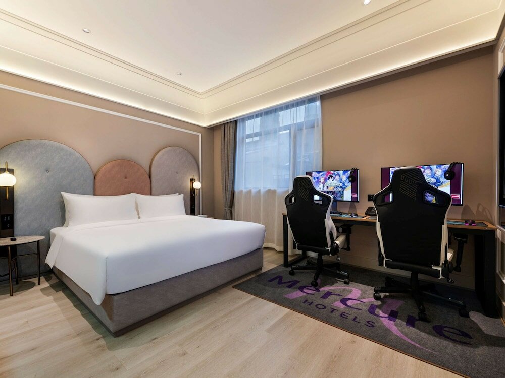 Фото Mercure Qingdao Downtown