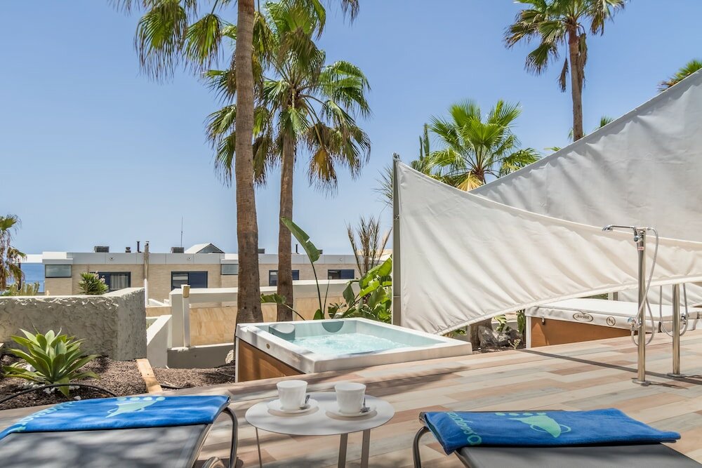 Фото Apartamentos Garden & Sea Boutique Lodging by Livvo