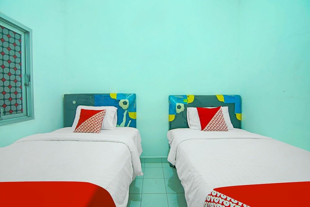 Фото Oyo 91730 De' Mande Homestay Syariah