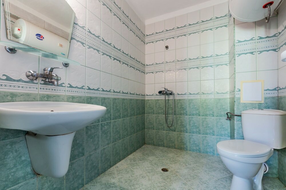 Фото 2 Bedroom Apartment in Dafinka Guest House