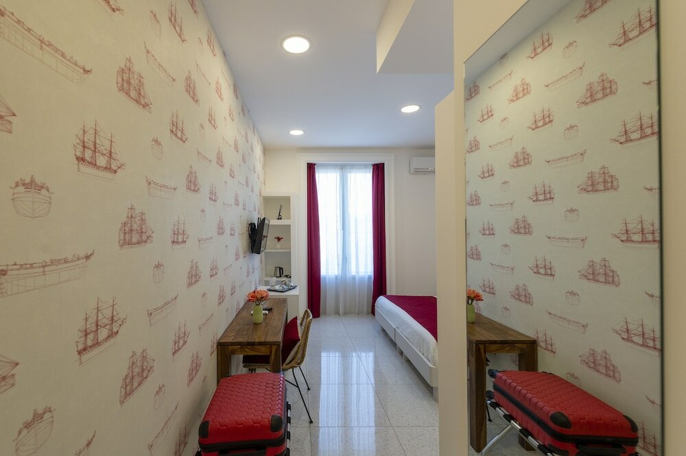 Фото Le Angioine Rooms