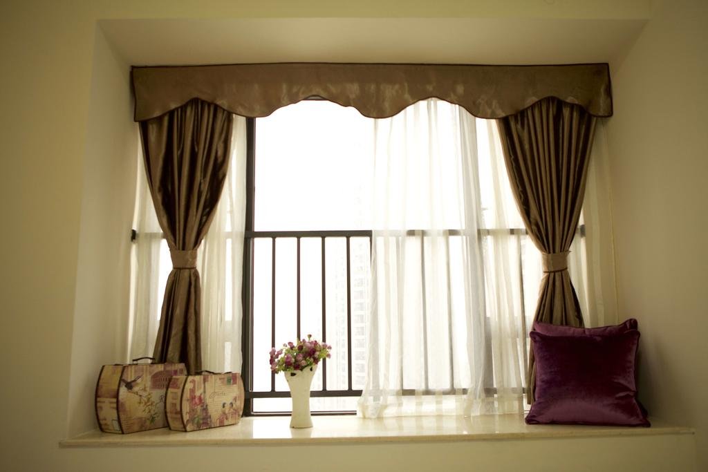 Фото Guangzhou Yi Long International Apartment