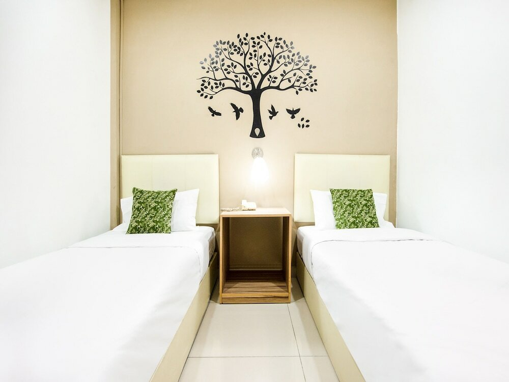 Фото Oyo 89618 Delegant Hotel