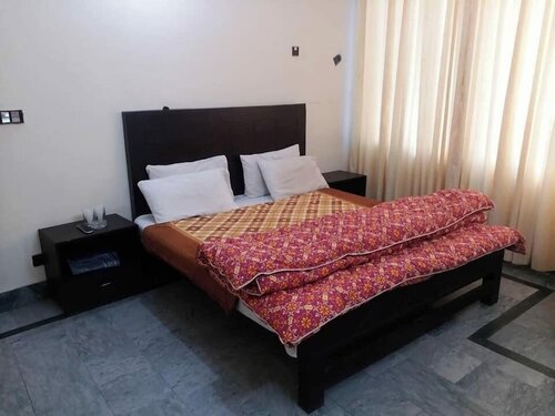 Гостиница Kashmir Inn Hotel Muzaffarabad в Музаффарабаде