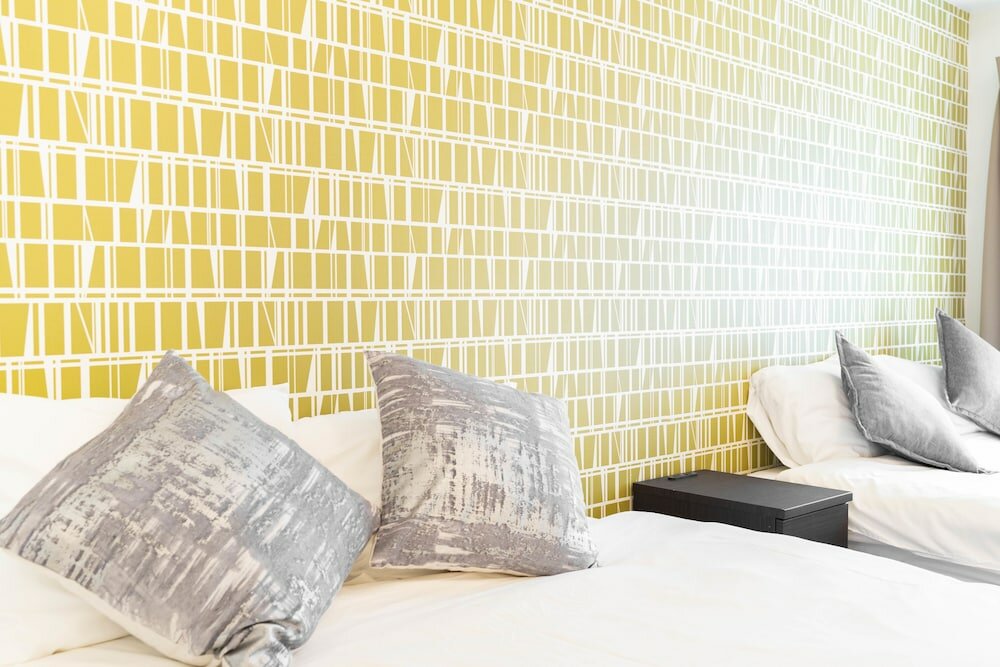 Фото Shinsaibash East Nana Apartment · Junan