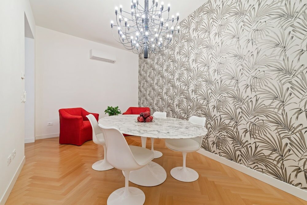 Фото San Fermo Luxury Apartment