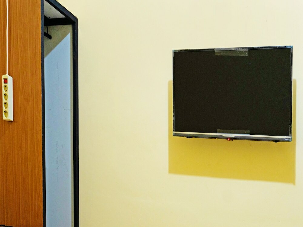 Фото Spot On 91402 Home'59 Tegal Danas