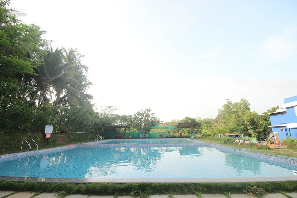 Фото Oyo 39345 Chrisander's Resort