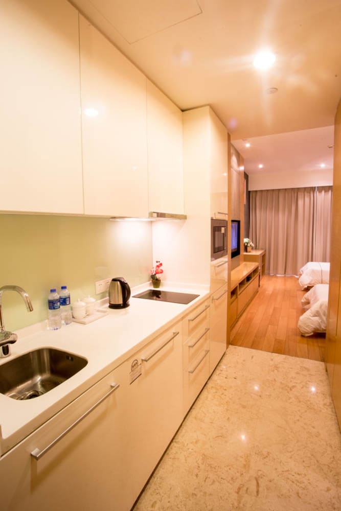 Фото Wanlong Apartment Pazhou Branch