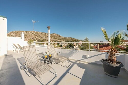 Гостиница Adelos Maisonette Near Vouliagmeni Beach