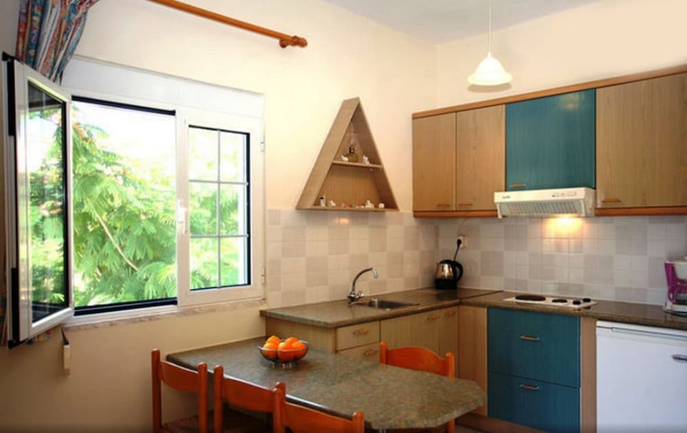 Фото Armonia Apartments & Studios