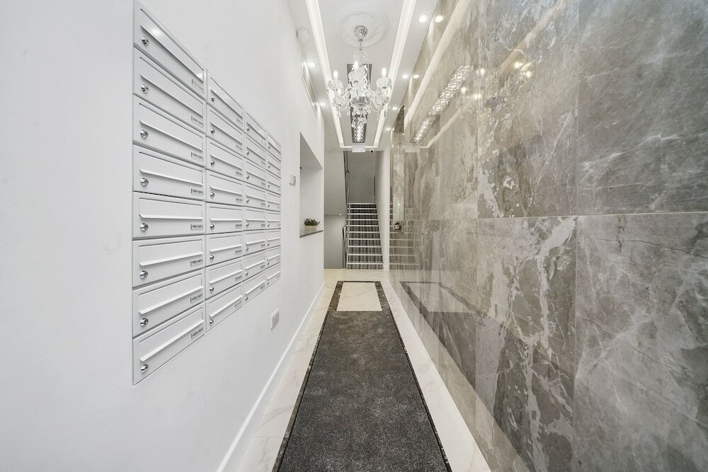 Фото Collingham Serviced Apartments