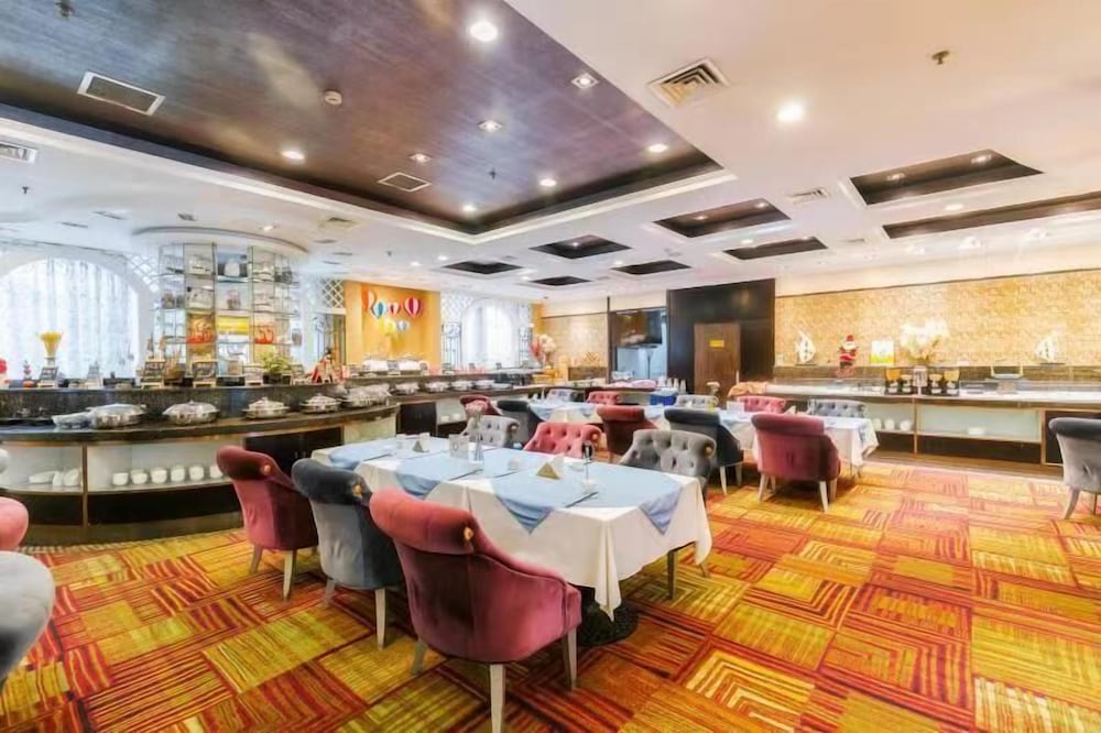 Фото Suning Universal Hotel All-Suites