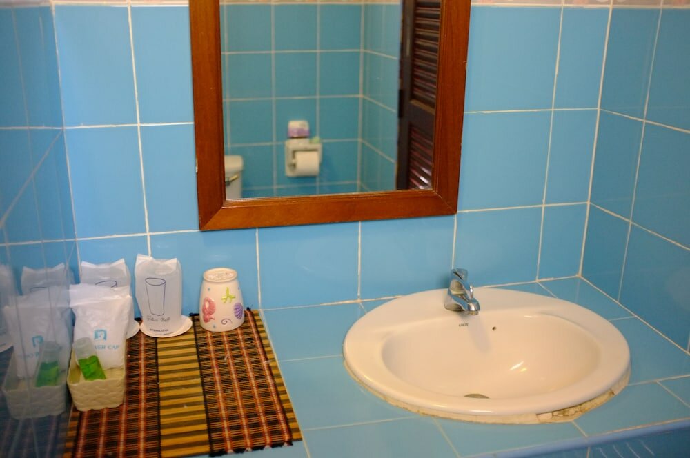 Фото Thaniza Beachfront Resort