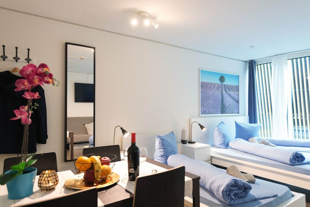 Фото Lu Bourbaki i - Allmend Hitrental Apartment