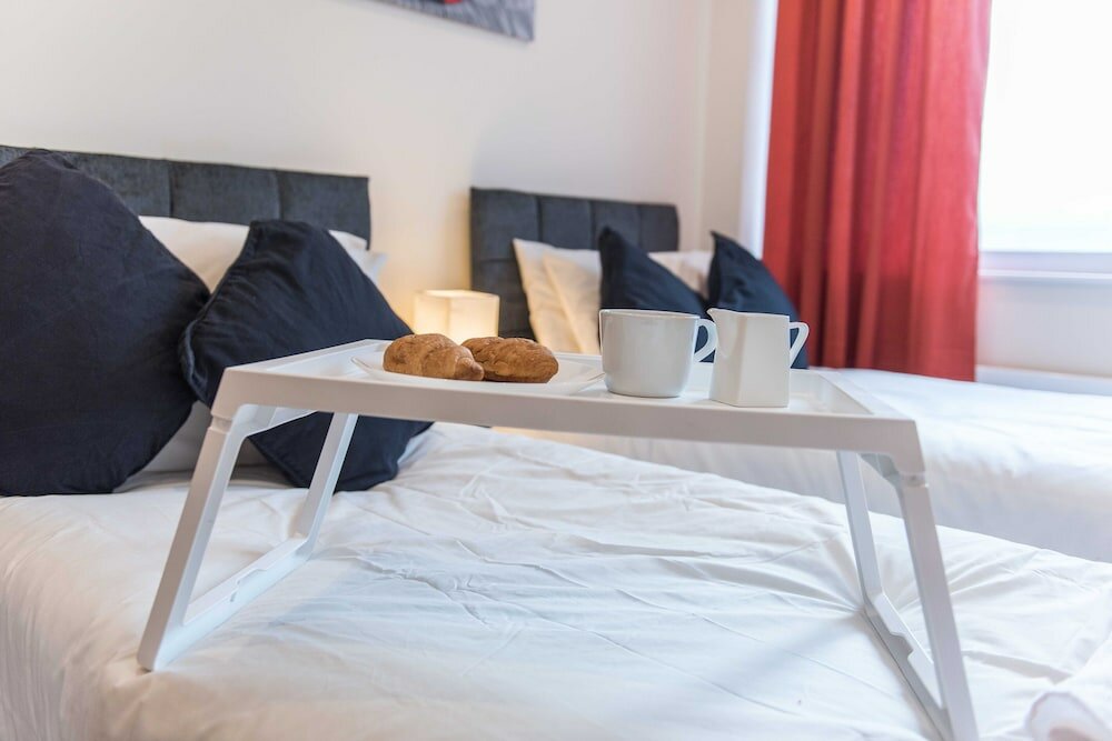 Фото Sublime Stays Apartments