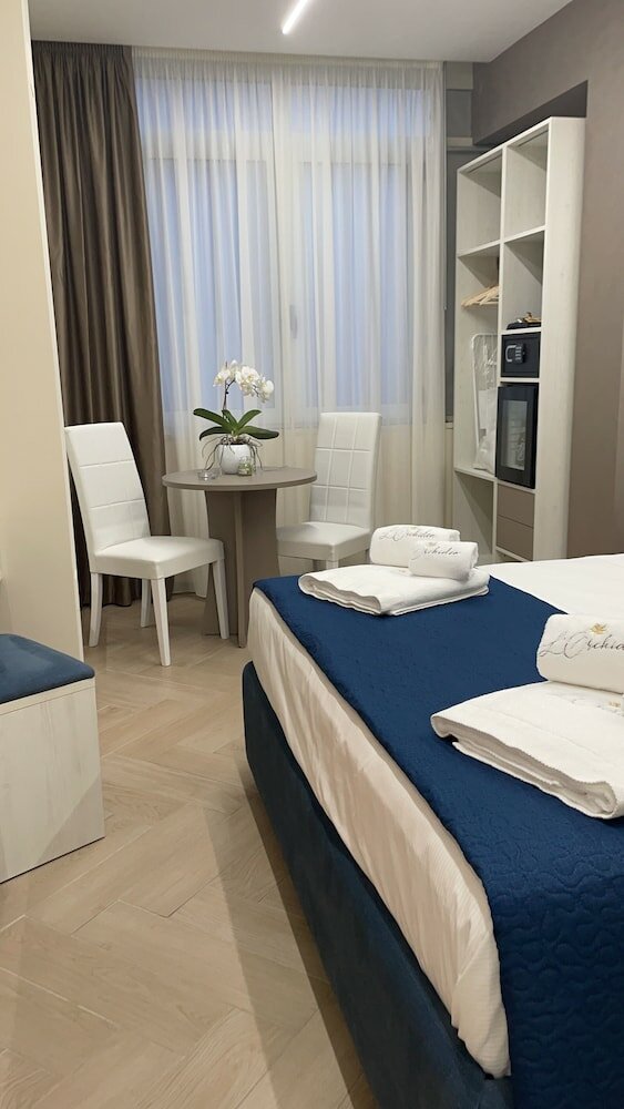 Фото B&b L'Orchidea