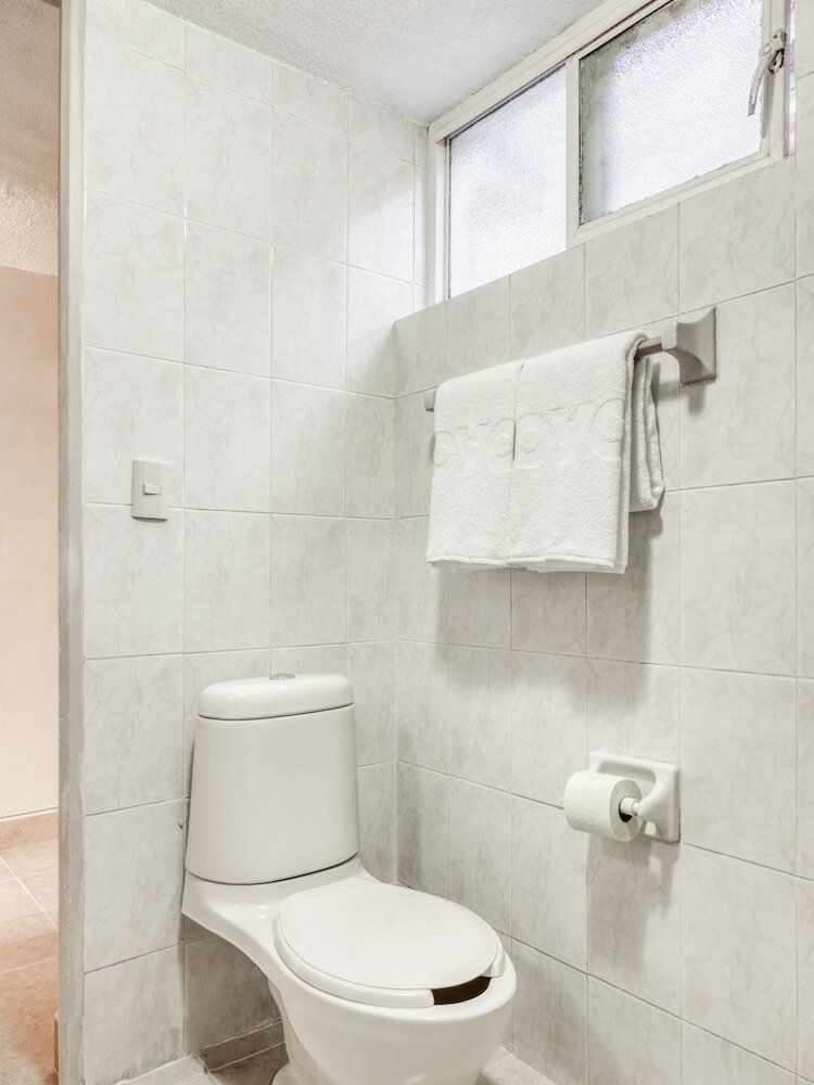 Фото Capital O Hotel La Siesta, Gómez Palacio