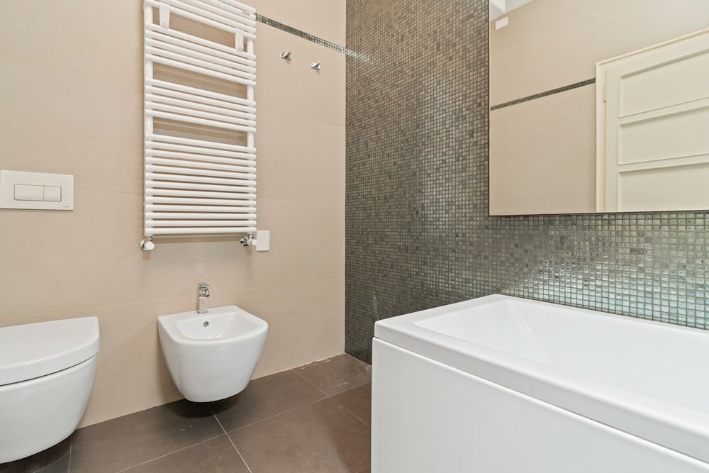 Фото San Fermo Luxury Apartment