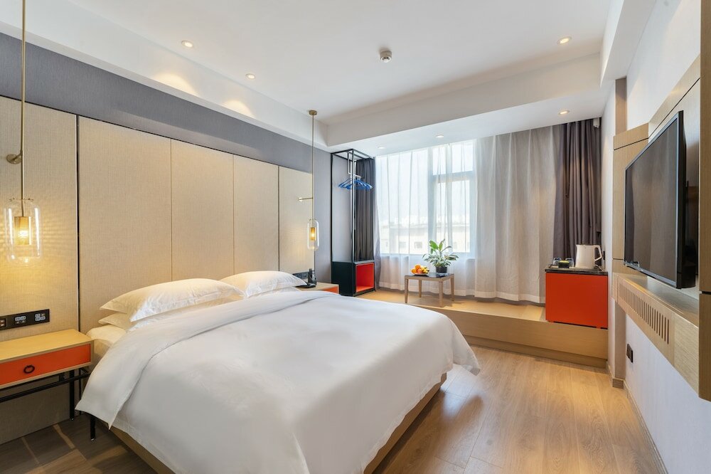 Фото Yì Wū Shì Bó Yì Měi Jū Hotel