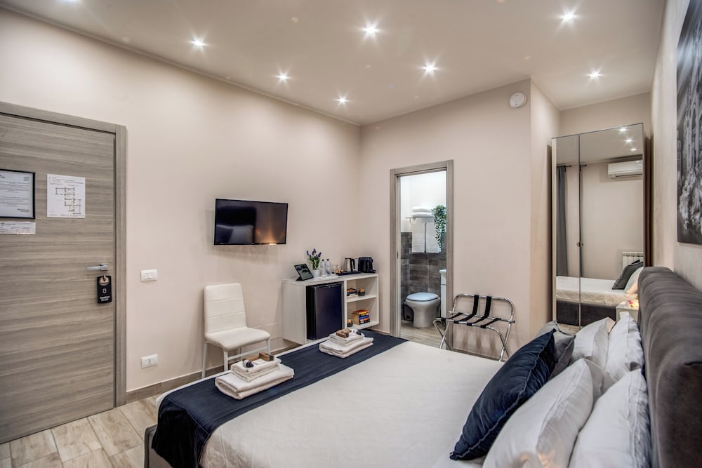 Фото Tacito 23 - Luxury rooms