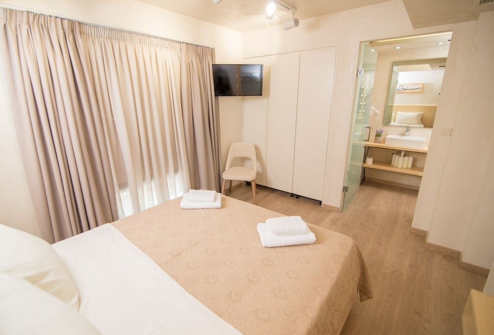 Фото Panellinion Luxury Rooms