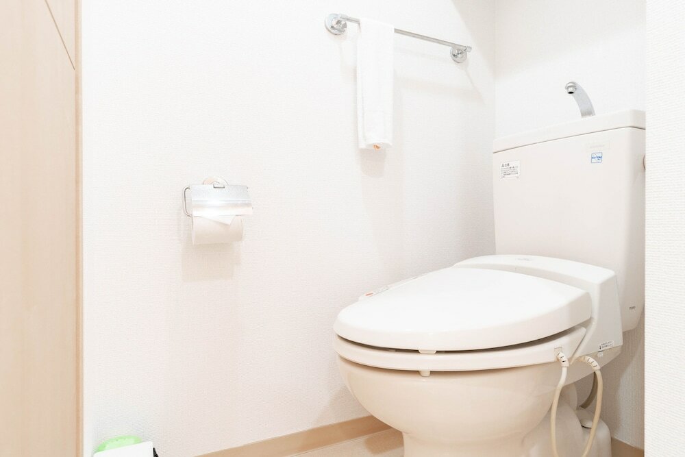 Фото Shinsaibash East Nana Apartment · Junan