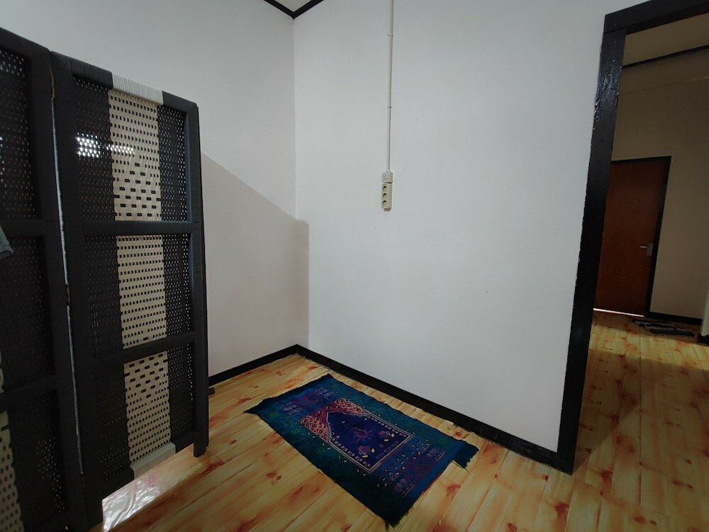 Фото Oyo 92357 Zzip Homestay