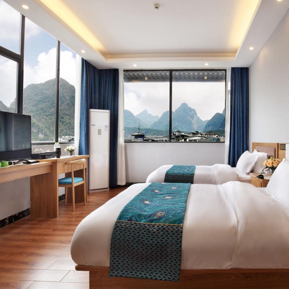 Фото Yangshuo Qingyunge Hotel