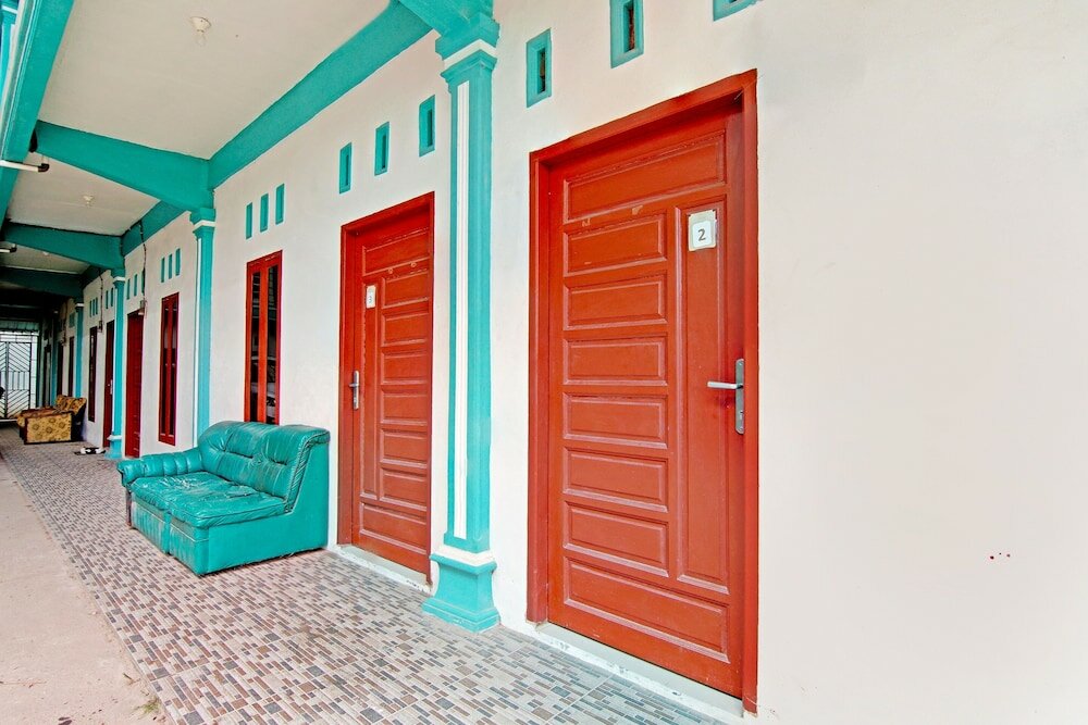 Фото Oyo 90752 Ridho Guest House Syariah