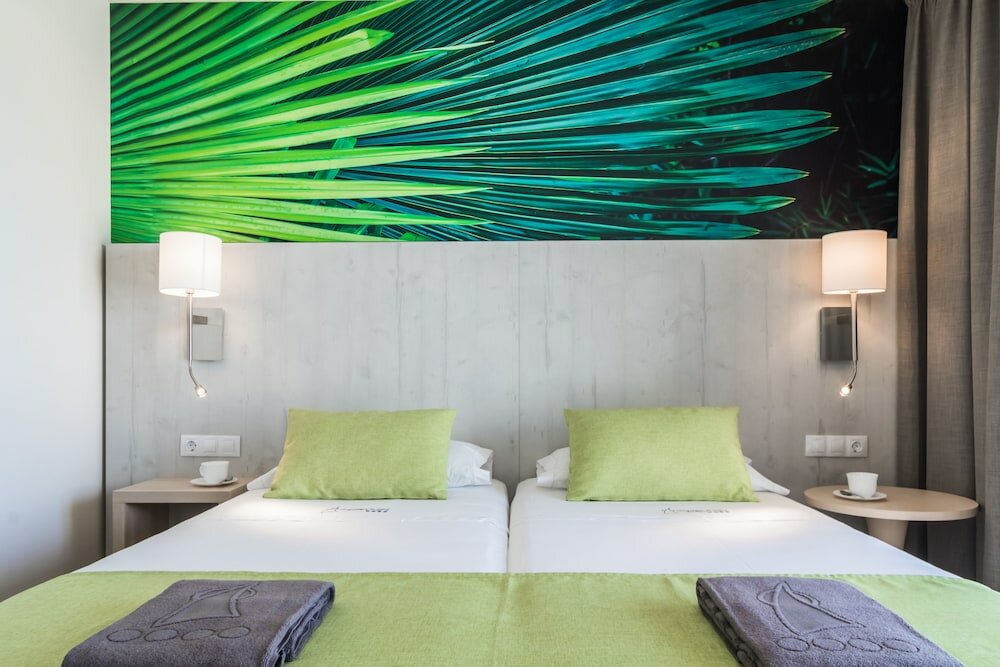 Фото Apartamentos Garden & Sea Boutique Lodging by Livvo