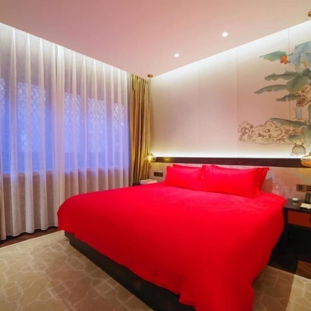 Фото Sanfang Qixiang Shuxiang Wenru Hotel