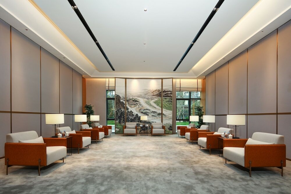 Фото Tiegang Jinjiangduchengjiudian