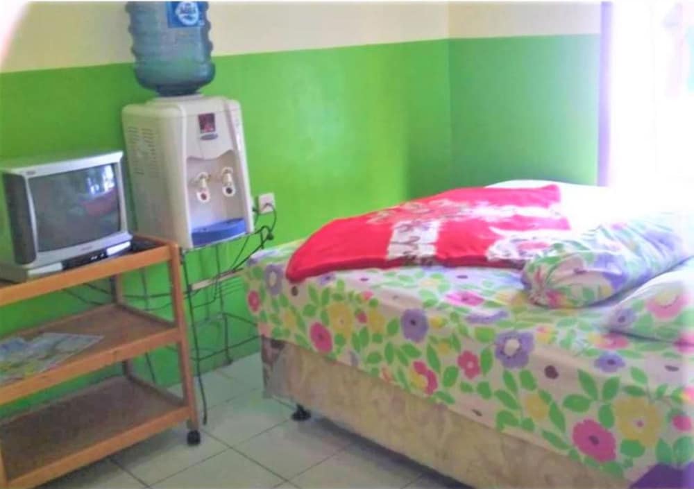 Фото Penginapan Rezeki