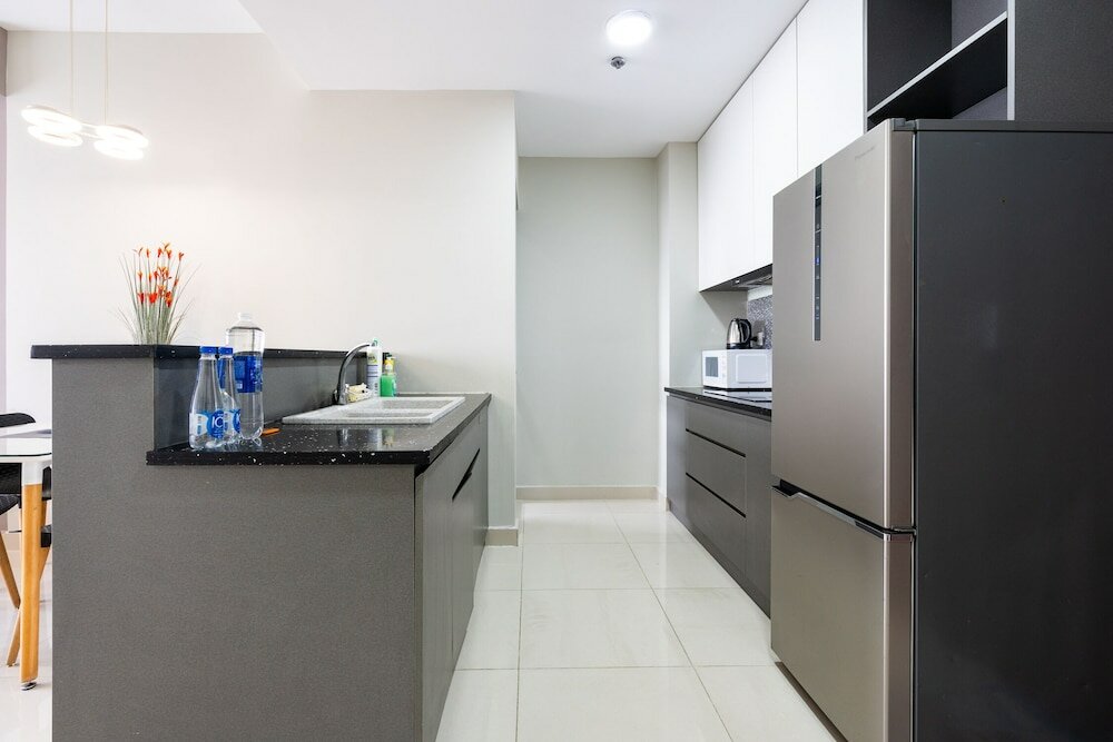 Фото Rivergate apartment infinity pool & Gym