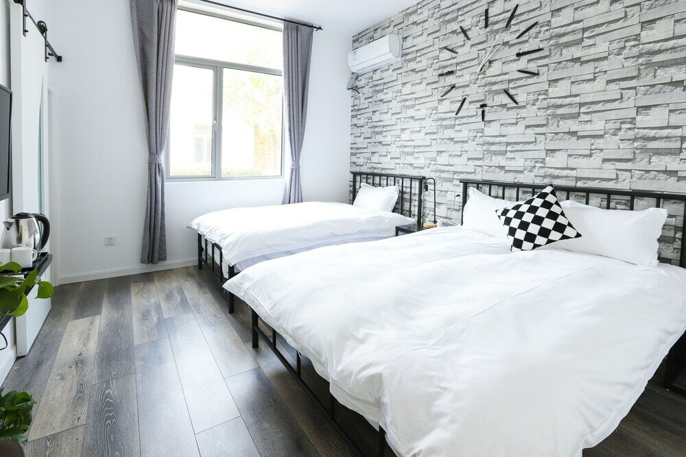 Фото Shanghai Yuelin Guesthouse