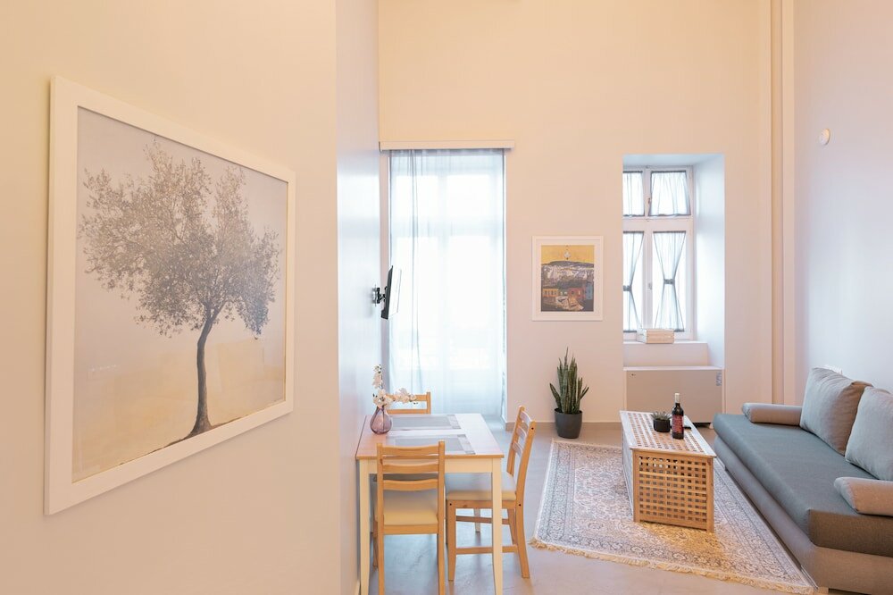 Фото Ether Loft Suites