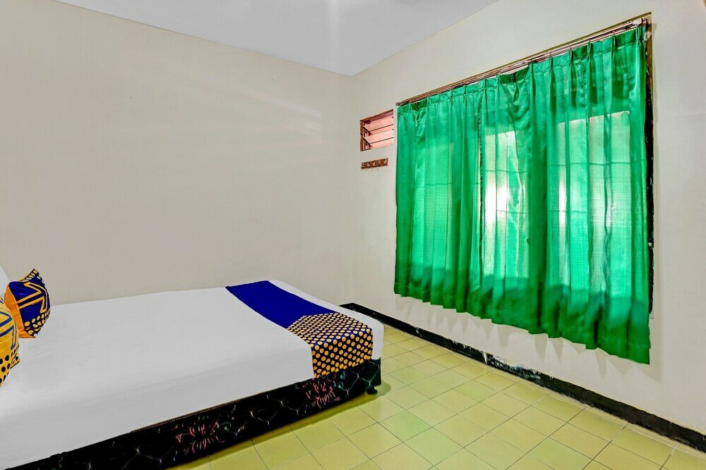 Фото Spot On 90098 Anak Mama Guesthouse